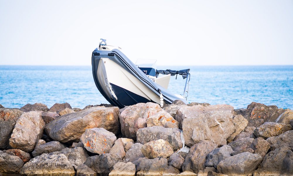 boat accident dike stranded motorboat dangerous transportation
